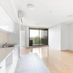 spacious modern kitchen and living area